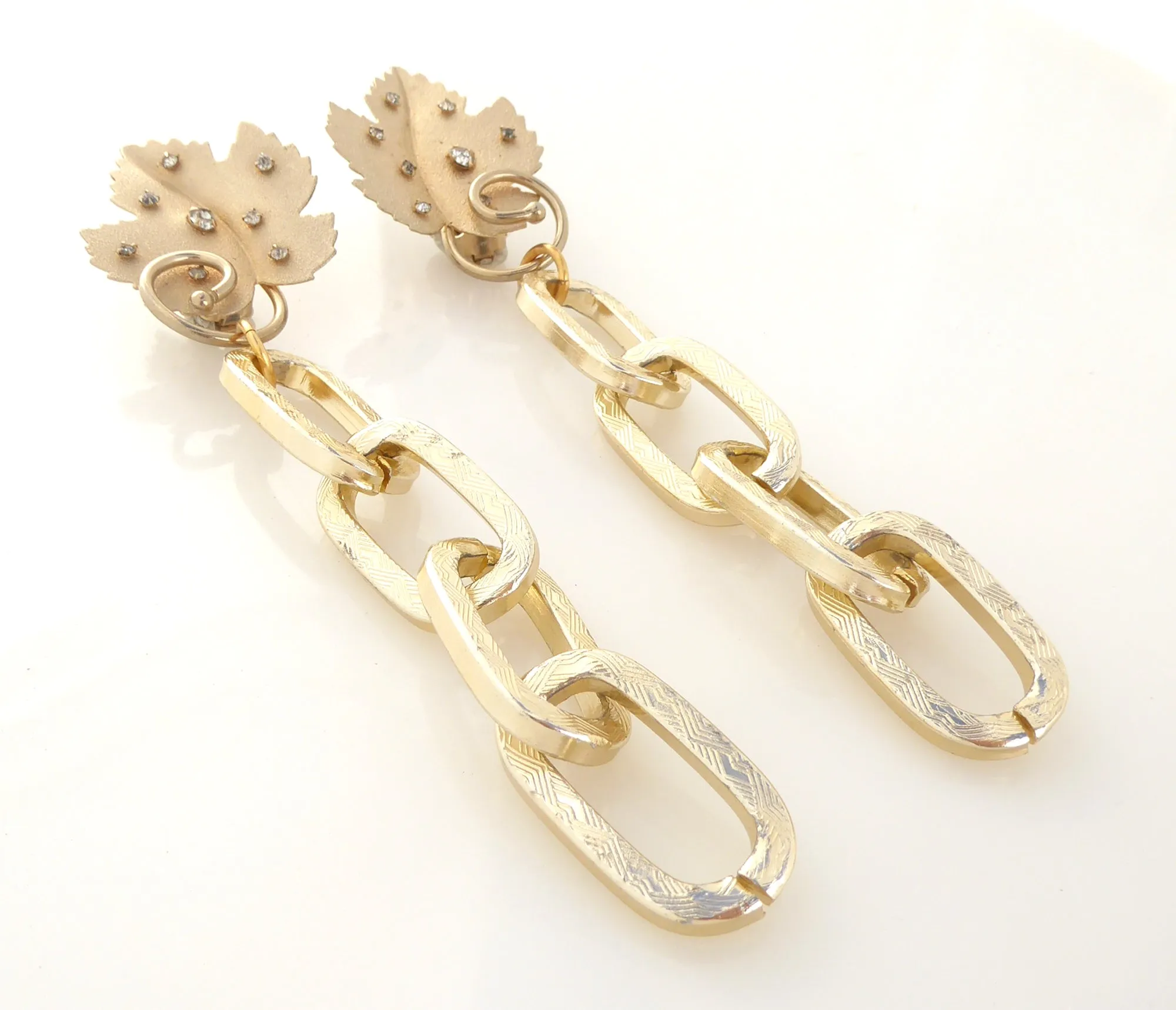 Gold rhinestone leaf earrings
