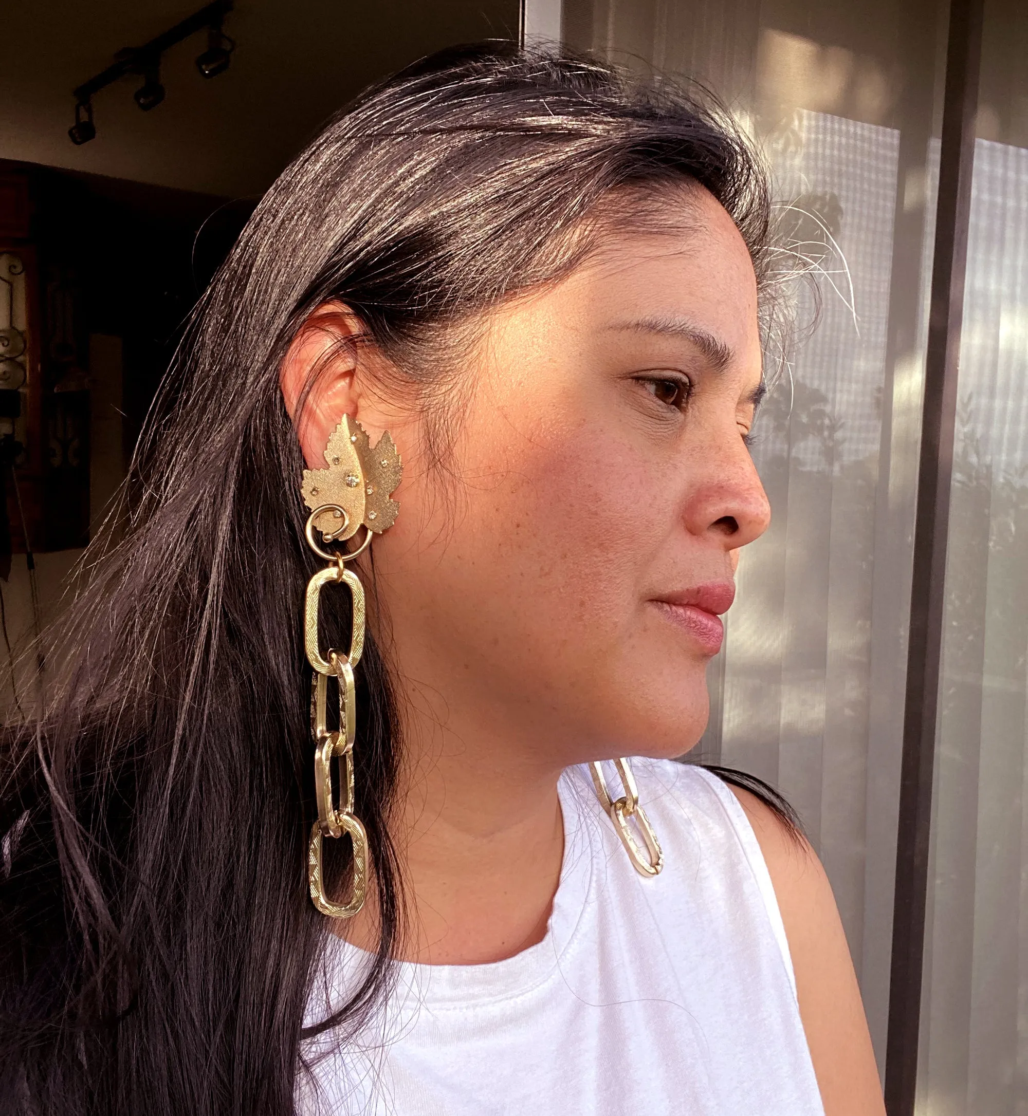 Gold rhinestone leaf earrings