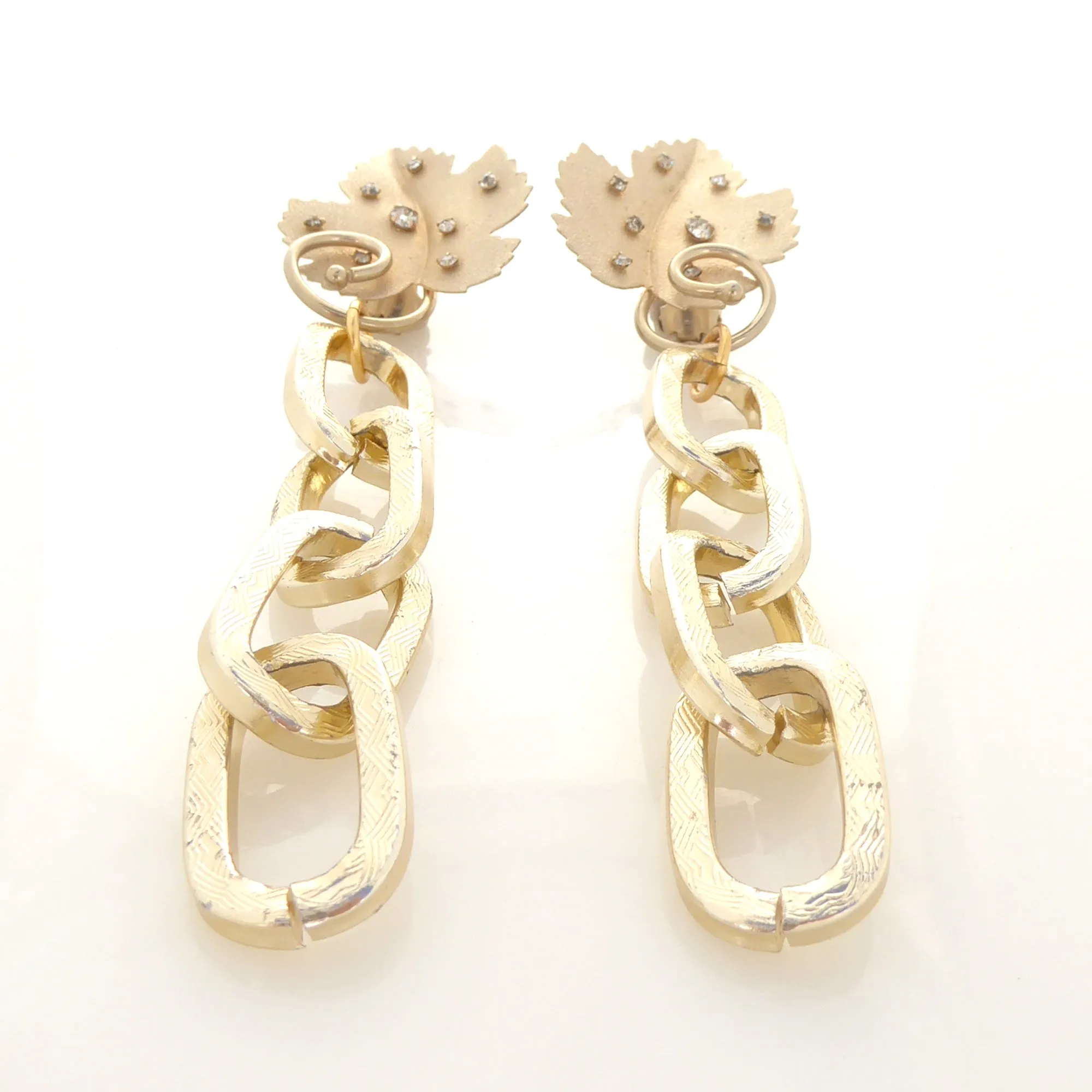 Gold rhinestone leaf earrings