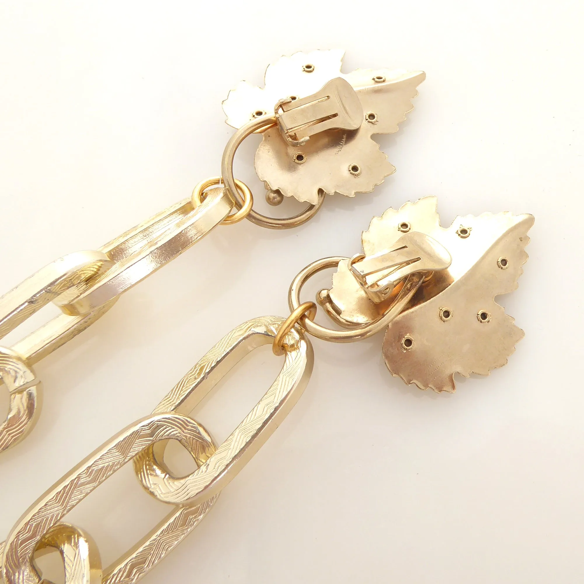 Gold rhinestone leaf earrings