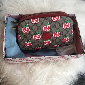 Gucci GG Supreme Canvas Apple Shoulder Bag